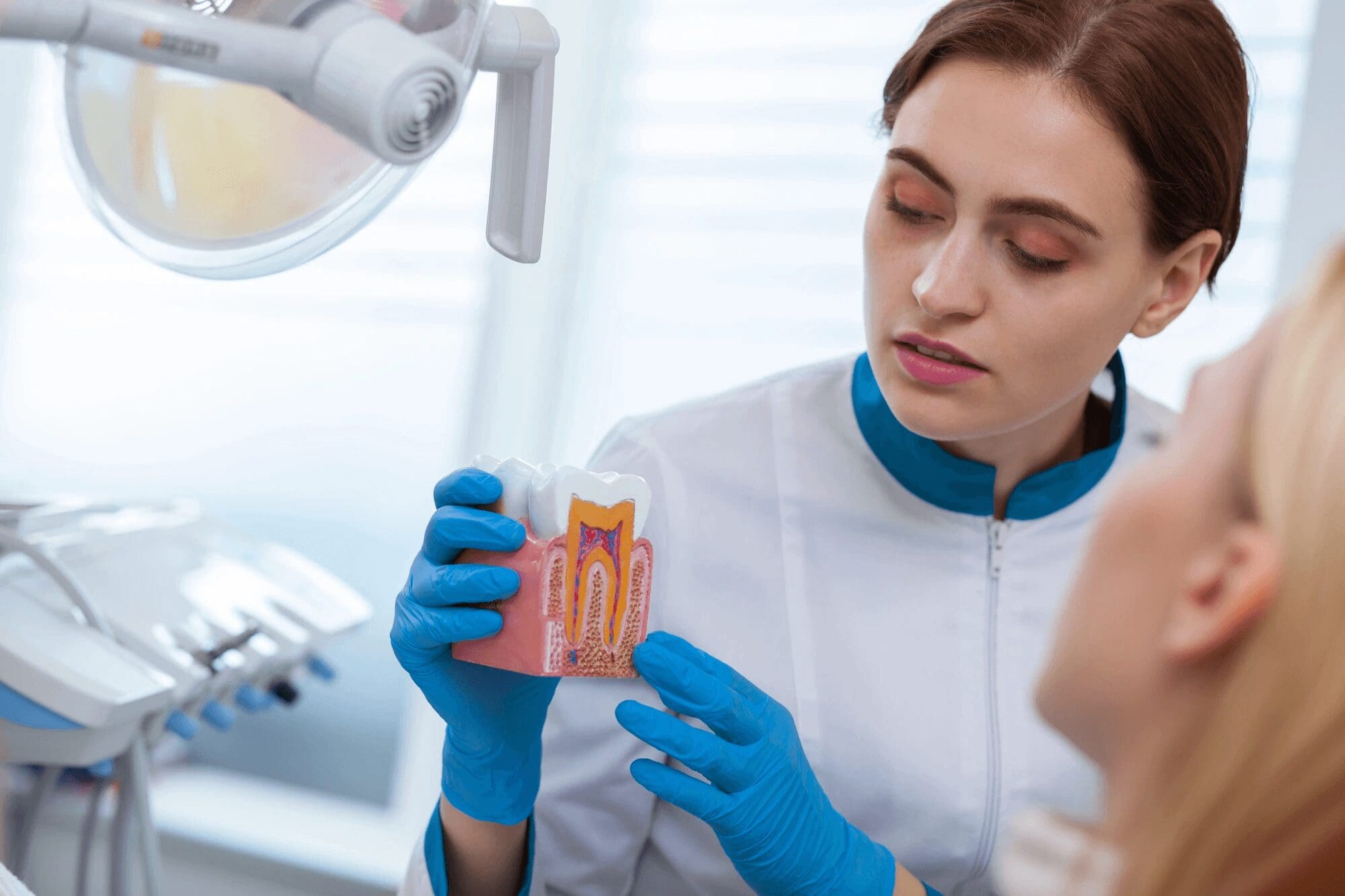dentist explaining a Cincinnati tooth extraction