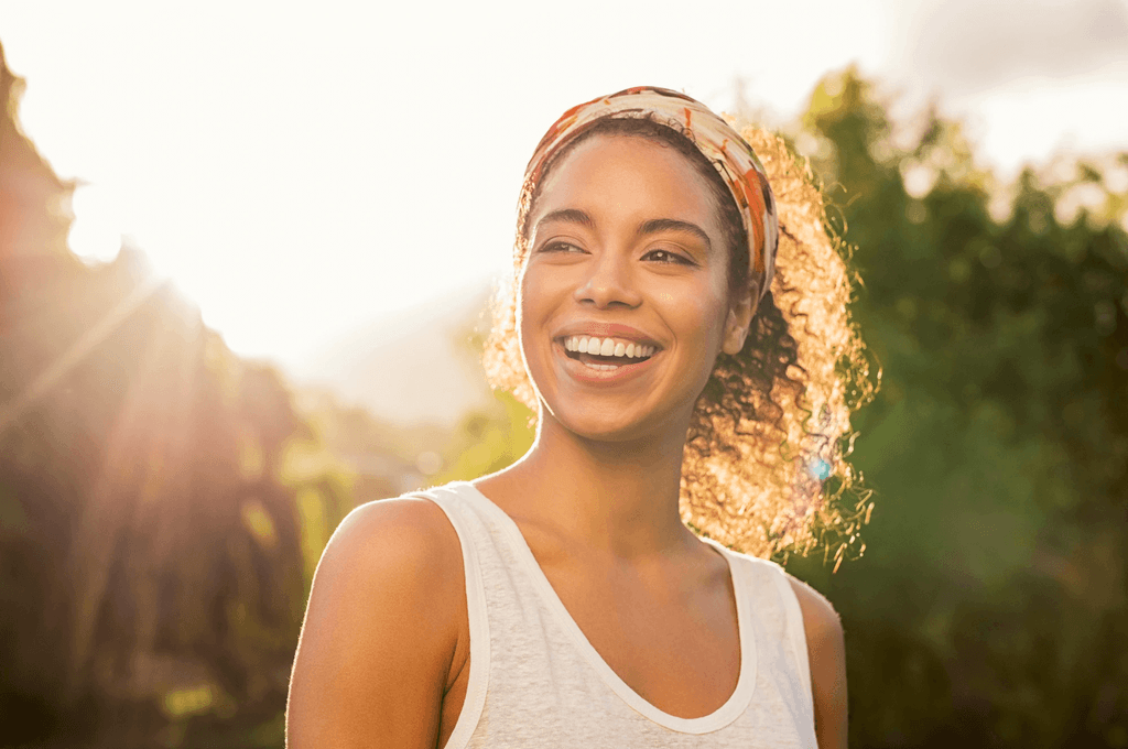 happy woman after a Cincinnati tooth extraction