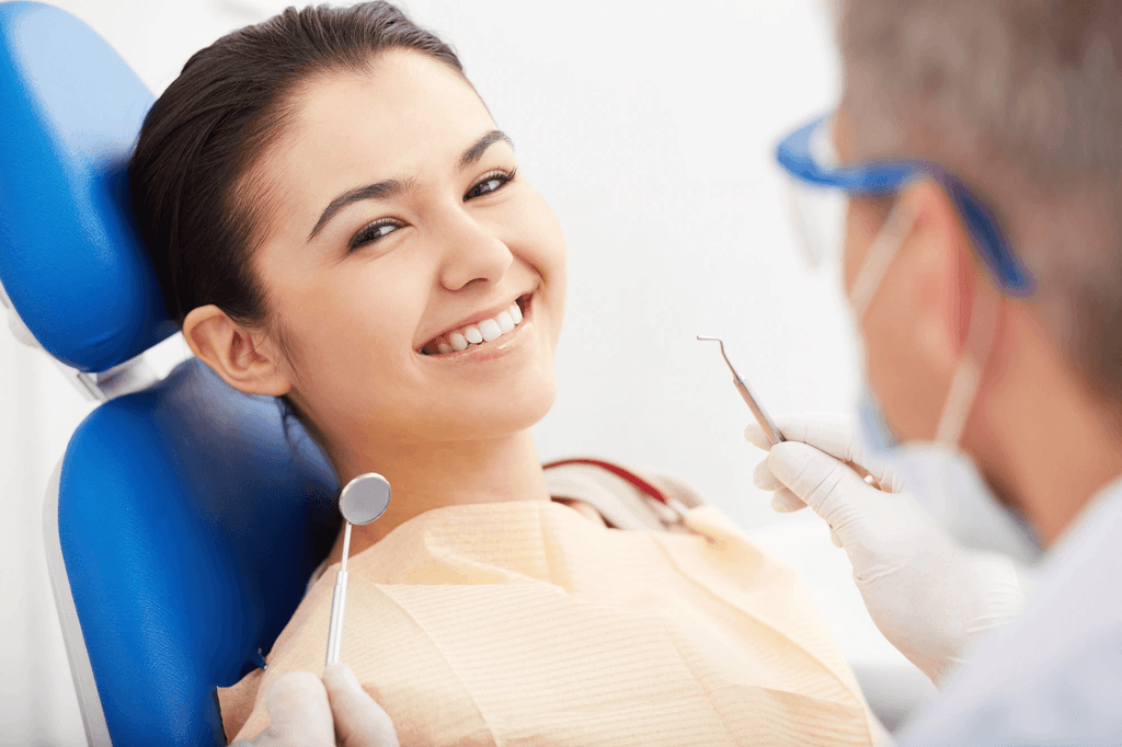 happy woman getting general dentistry in Cincinnati